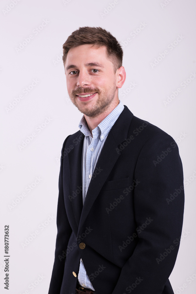 Businessman portrait on a young background smile Businessman portrait on a young background smile