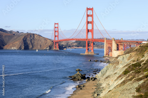 Golden Gate Bridge and Baker Beach on a clear autumn sunny day. San Francisco, California, USA.