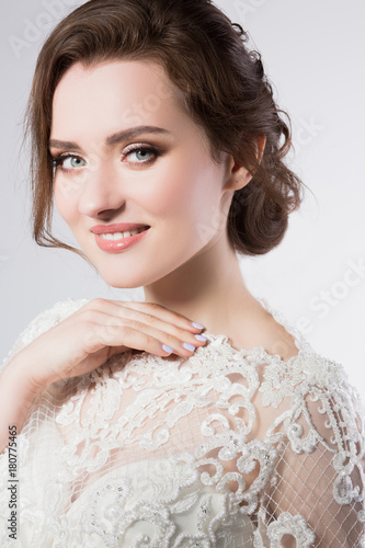 portrait of a bride happy girl in a make-up hairstyle