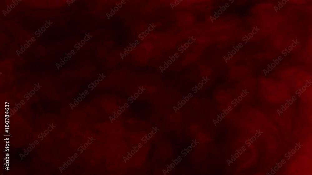 scarlet paint dissolves in the liquid. Slow motion scarlet paint dissolves in the liquid. Slow motion