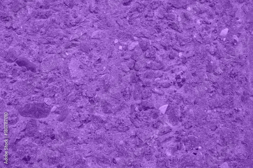 Violet wall of natural stone, texture, background