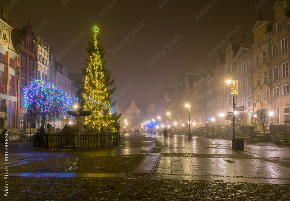 Night at medieval Long Market street (Dlugi Targ) in Gdansk. Misty scenery.  Poland.