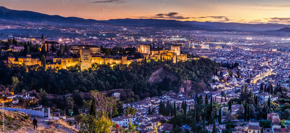 Alhambra in Granada at a beautiful sunset in the early evening. 