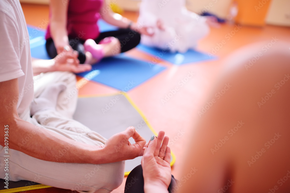 yoga group performs asanas in the fitness center yoga group performs asanas in the fitness center