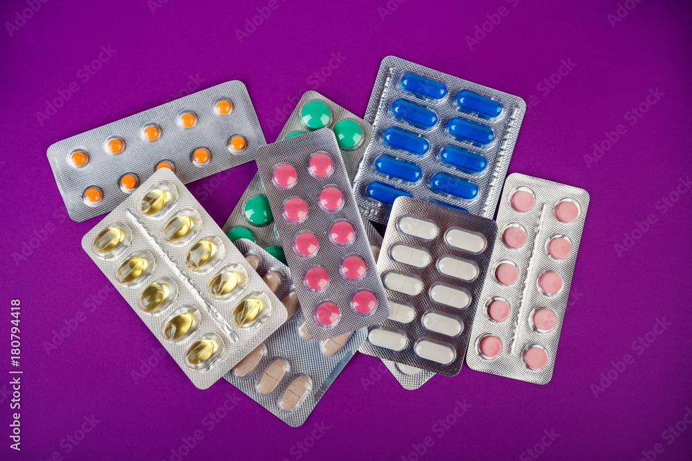 the group of color medical pills in packages the group of color medical pills in packages