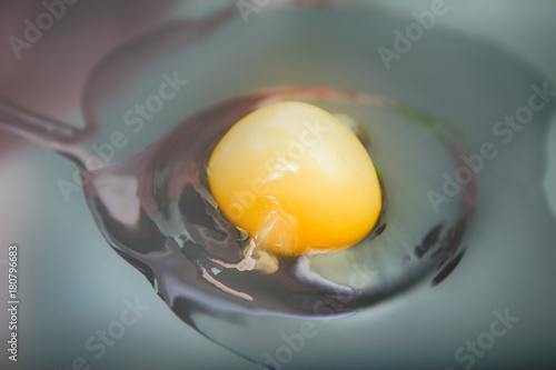 break egg on black background photo