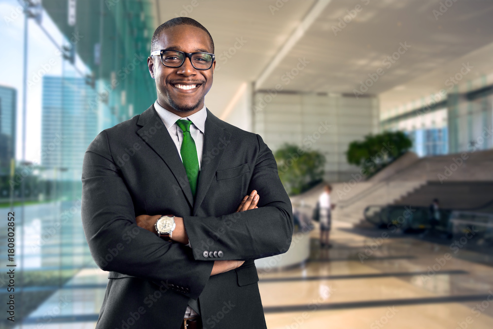 African american bank manager owner ceo business man standing confidently  with pride in financial building Stock Photo | Adobe Stock