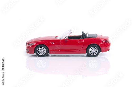 Red toy or model convertible sport car.