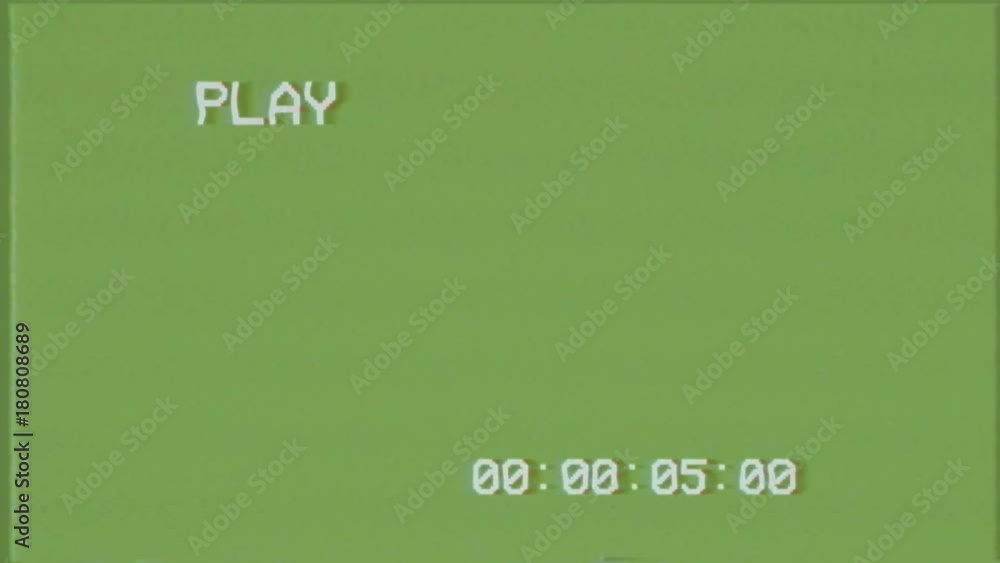 An old bad VHS tape playing. Green screen with PLAY text and timer. A vintage background for