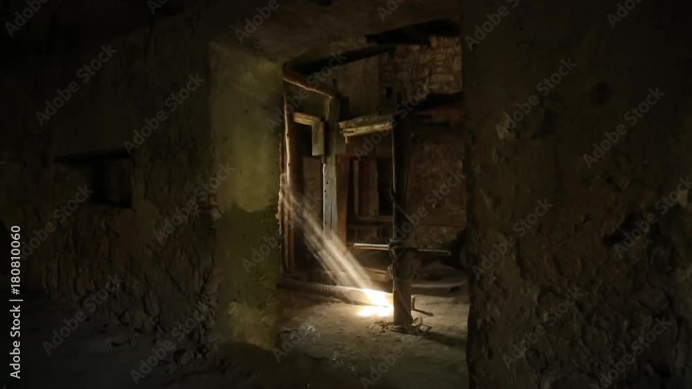 POV, sun shines through window in dusty basement POV, sun shines through window in dusty basement