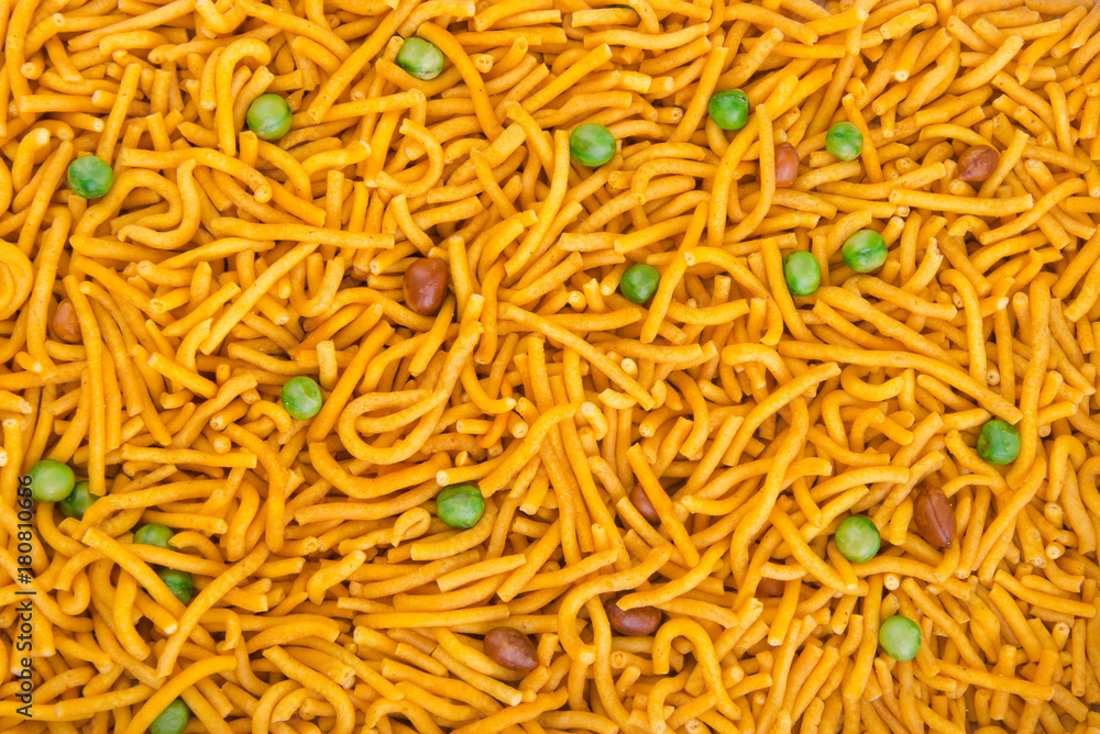 murukku or traditional indian snack on background. murukku or traditional indian snack on background.