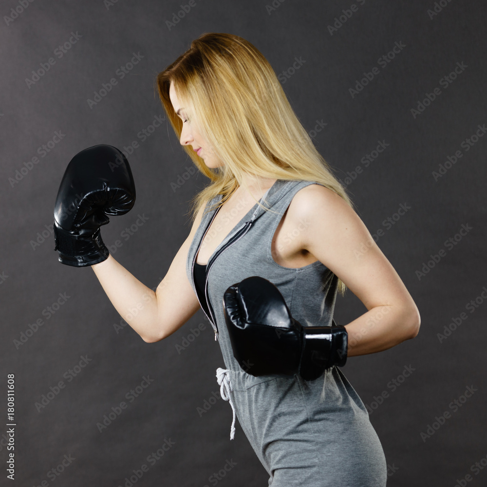 Boxer girl exercise with boxing gloves. Boxer girl exercise with boxing gloves.