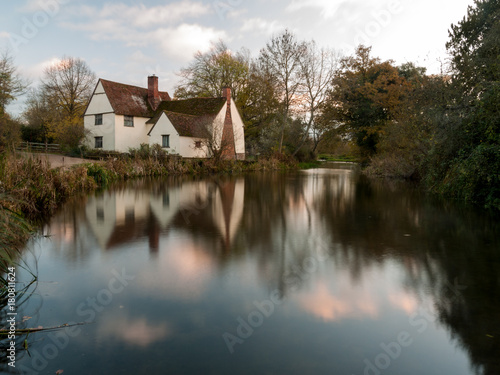 beautiful willy lotts cottage autumn long exposure blurred water constable country flatford mill photo