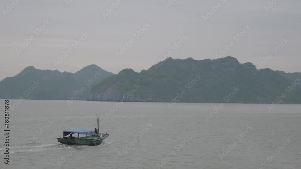 Boat travels in Ha Long Bay, wide Boat travels in Ha Long Bay, wide
