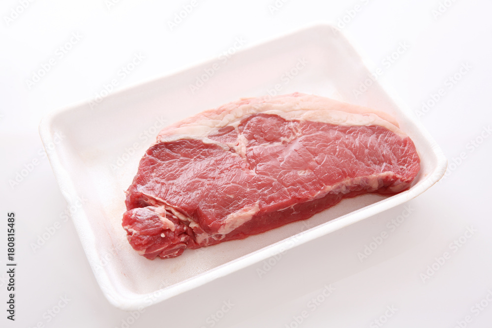Fresh raw beef steak isolated in white background Fresh raw beef steak isolated in white background