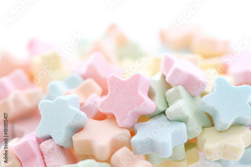 Colourful Star Milk pellets isolated in white background