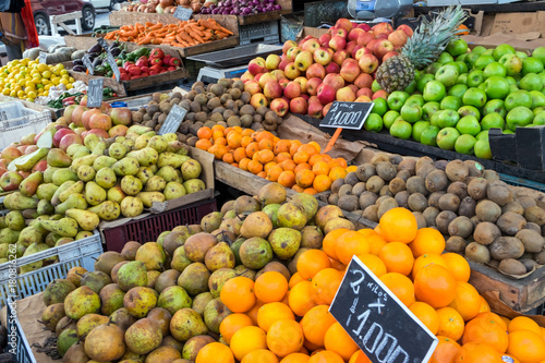 Piles of fruits for sale at a market in Valparaiso, Chile
