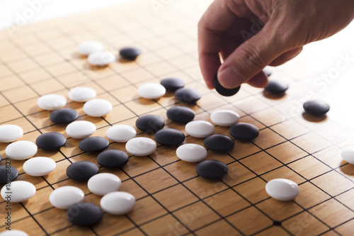 Go. Traditional asian strategy board game. photo