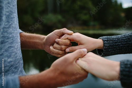 Black and white couple holding hands