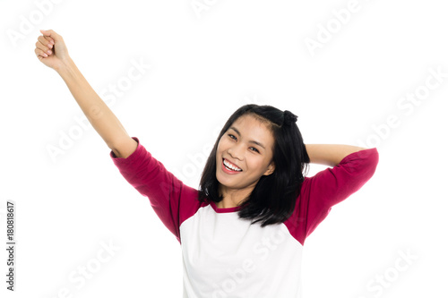 Beautiful asian woman celebrating success portrait studio on white background
