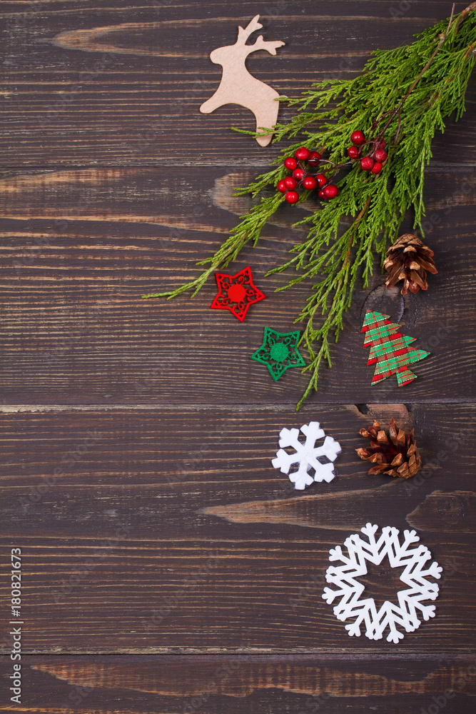 Christmas and New Year background. Winter holidays concept with decorations on wooden background. View from above, top studio shot, vertical Christmas and New Year background. Winter holidays concept with decorations on wooden background. View from above, top studio shot, vertical