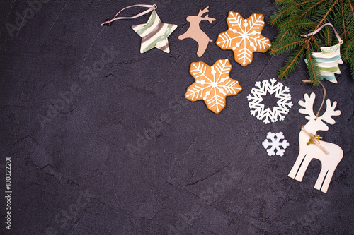 Christmas and New Year border or frame on black background. Winter holidays concept. View from above, top studio shot, horizontal