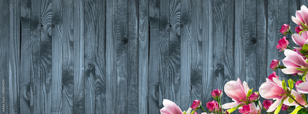 Holiday background with pink magnolia flowers and roses Holiday background with pink magnolia flowers and roses