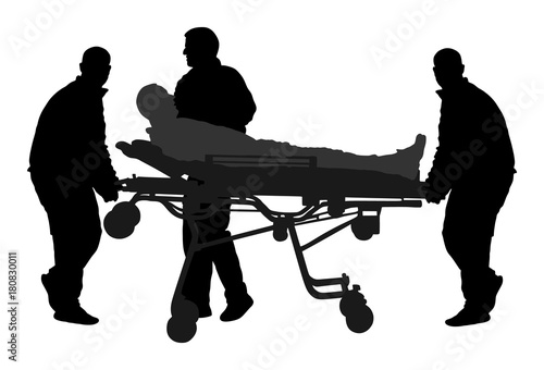 First aid crew help injured person after crash accident transport . Paramedic evacuate man by hospital stretcher trolley silhouette. Helping people after body collapse. Health care. Lifeguard action.