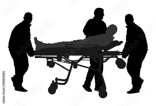 First aid crew help injured person after crash accident transport . Paramedic evacuate man by hospital stretcher trolley silhouette. Helping people after body collapse. Health care. Lifeguard action.