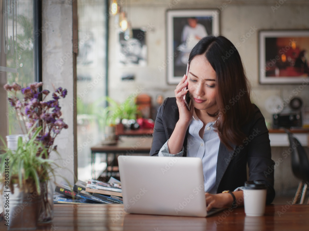 Asian business woman with laptop happy and smile concept success work Asian business woman with laptop happy and smile concept success work