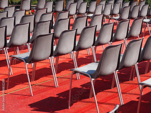Empty chairs before the conference
