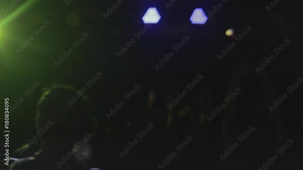 People dancing at the rave. People dancing at the rave.