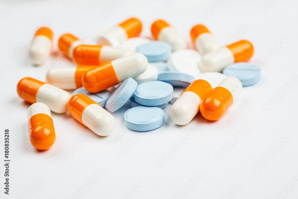 Medications and pills on a white background closeup shot
