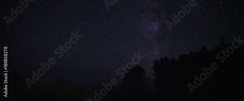 Fototapeta Naklejka Na Ścianę i Meble -  Night sky over rural landscape. Beautiful night starry sky