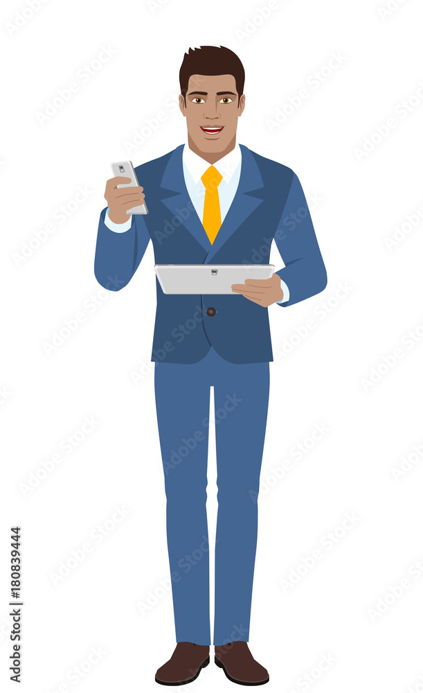 Businessman with mobile phone holding digital tablet PC Businessman with mobile phone holding digital tablet PC