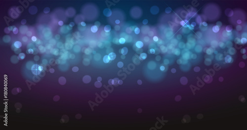 Christmas bokeh background defocused lights. Glowing techno abstract background