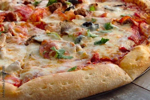 Pizza On An Old Wooden Desk
