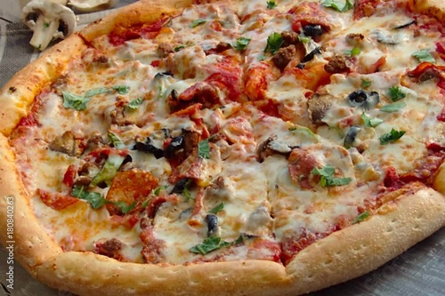 Pizza On An Old Wooden Desk