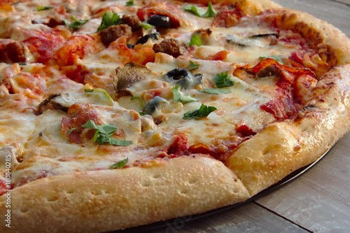 Pizza On An Old Wooden Desk