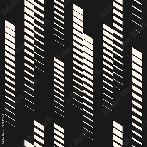 Abstract geometric seamless pattern with vertical fading lines, tracks, halftone stripes. Extreme sport style illustration, urban art. Trendy black and white graphic background texture. Stock vector photo
