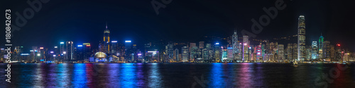 Colorful panoramic view of Hong Kong skyline on night time seen from Kowloon. Hong Kong, China.