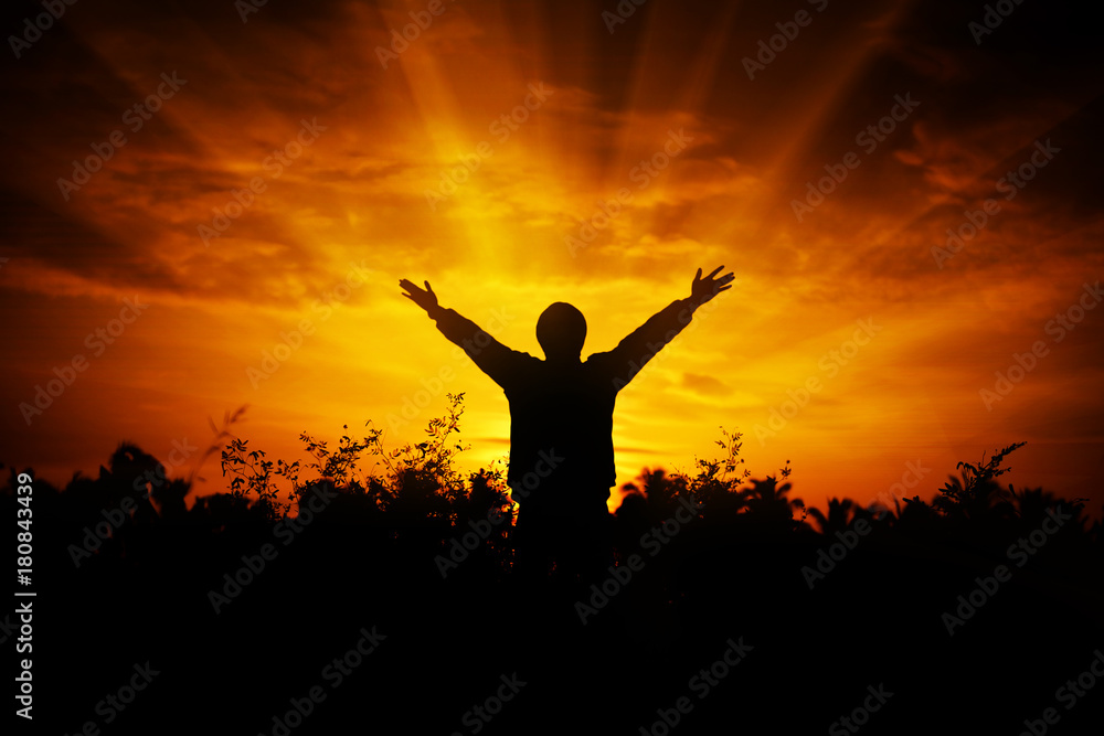 Men raise their arms up the sky. Thank God