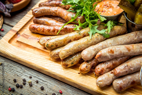 a set of different sausages, grilled on plate