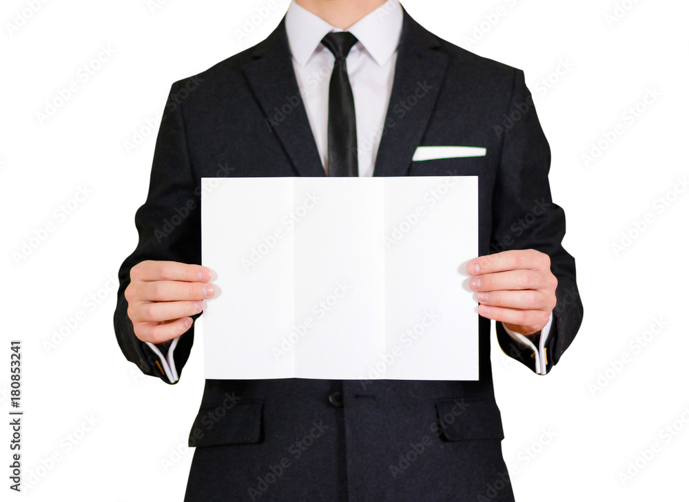 Man showing blank black flyer brochure booklet. Leaflet presentation. Pamphlet hold hands. Man show clear offset paper. Sheet template. Man in a black suit, white shirt and tie. On white background Man showing blank black flyer brochure booklet. Leaflet presentation. Pamphlet hold hands. Man show clear offset paper. Sheet template. Man in a black suit, white shirt and tie. On white background