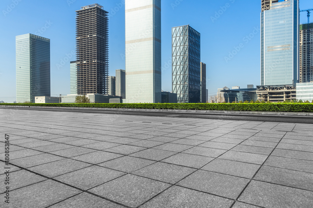 empty brick floor with cityscape and skyline.