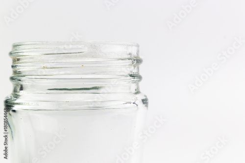 Closed up of transparent glass of bottle with spiral on top