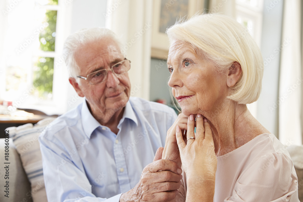 Senior Man Comforting Woman With Depression At Home Senior Man Comforting Woman With Depression At Home