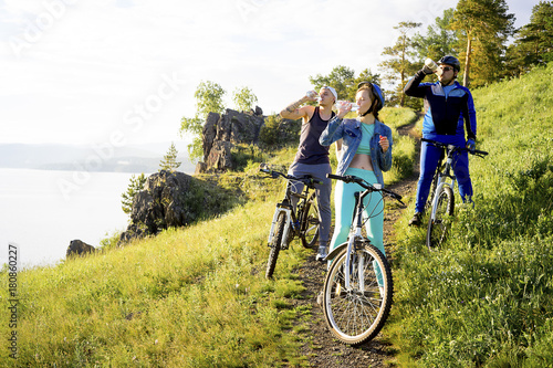 People travelling on a bicycle