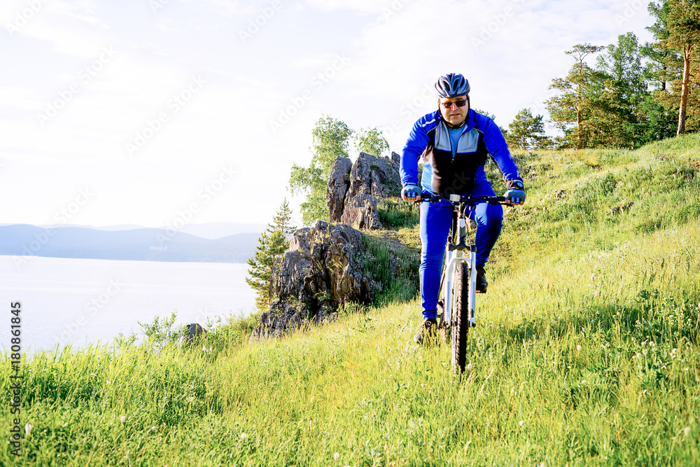 Man travelling on a bicycle