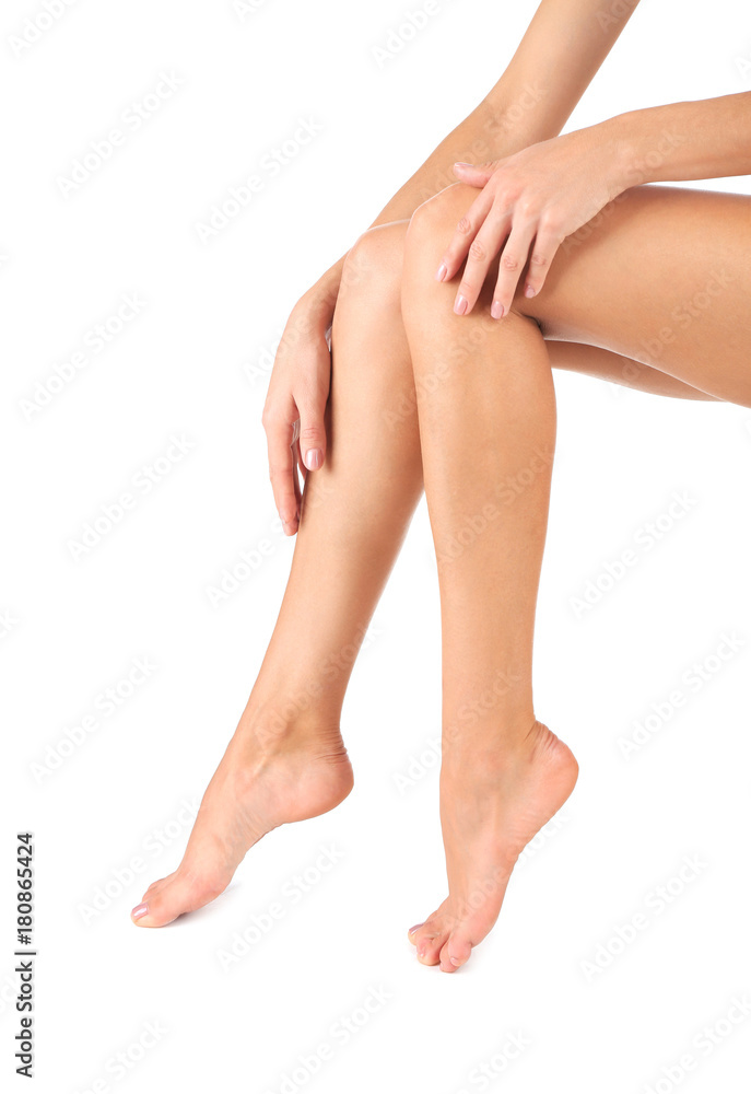 Legs of beautiful young woman on white background Legs of beautiful young woman on white background